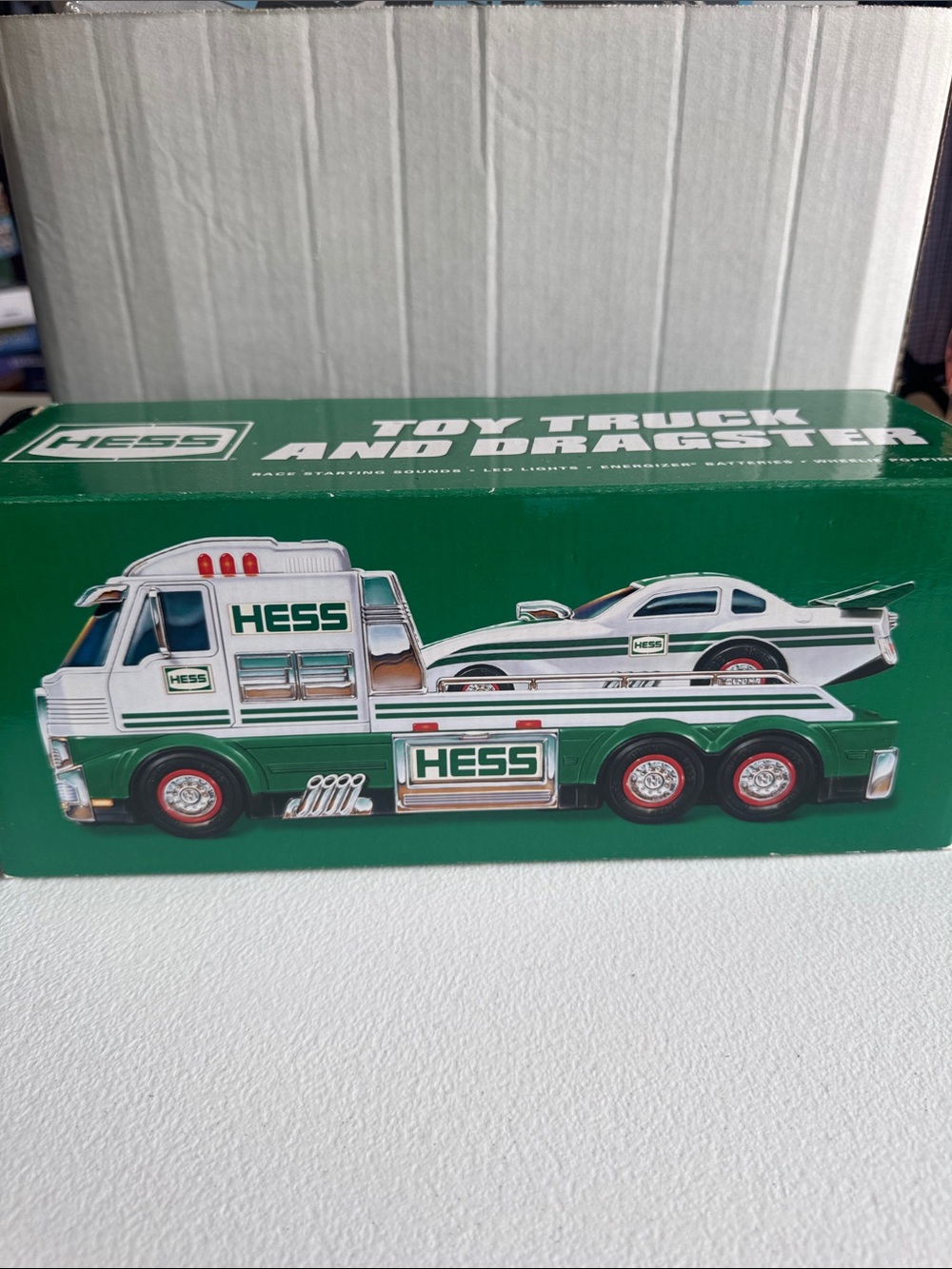 HESS Green and White Tow Truck with Racer Car